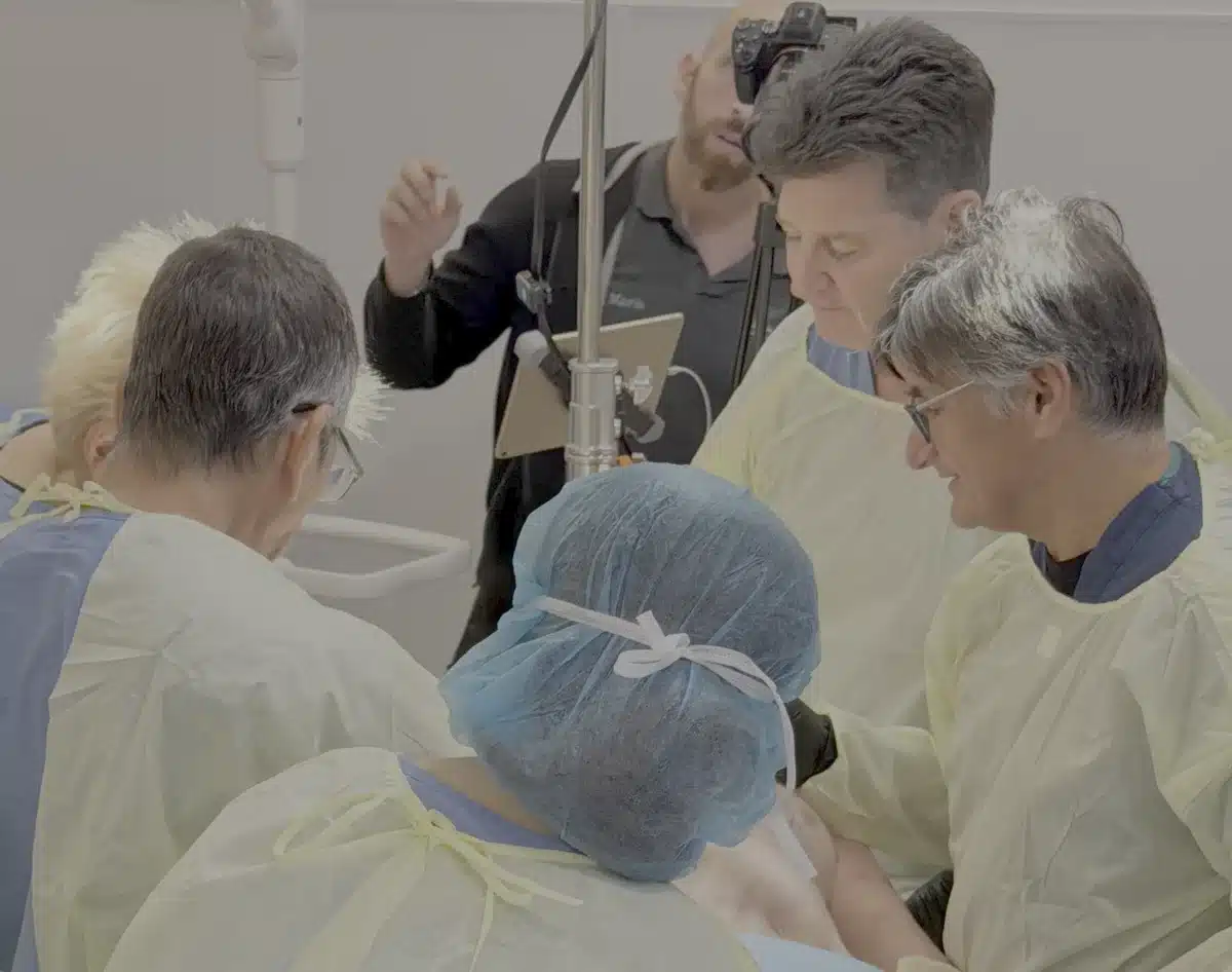 Dr. Robert Troell instructing a hands-on body implant cadaver training course